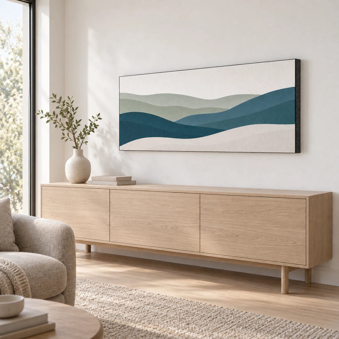 PIX Slim Frame in Salbei und Petrol mit schwarzer Filzkante über einem Eichen-Sideboard.